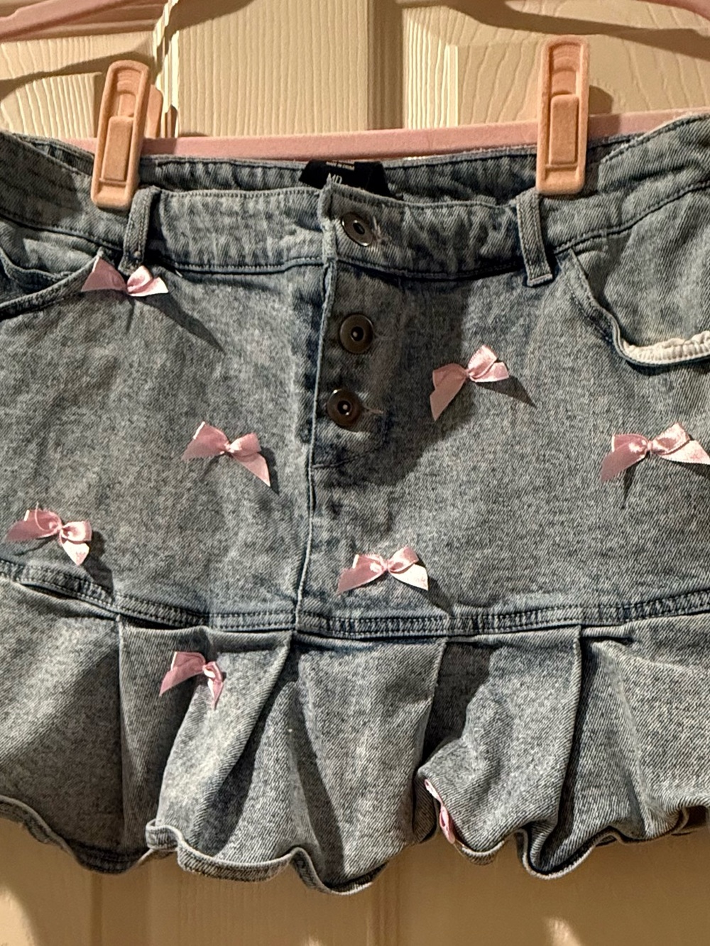Denim Mini Skirt with Pink Bow Accents